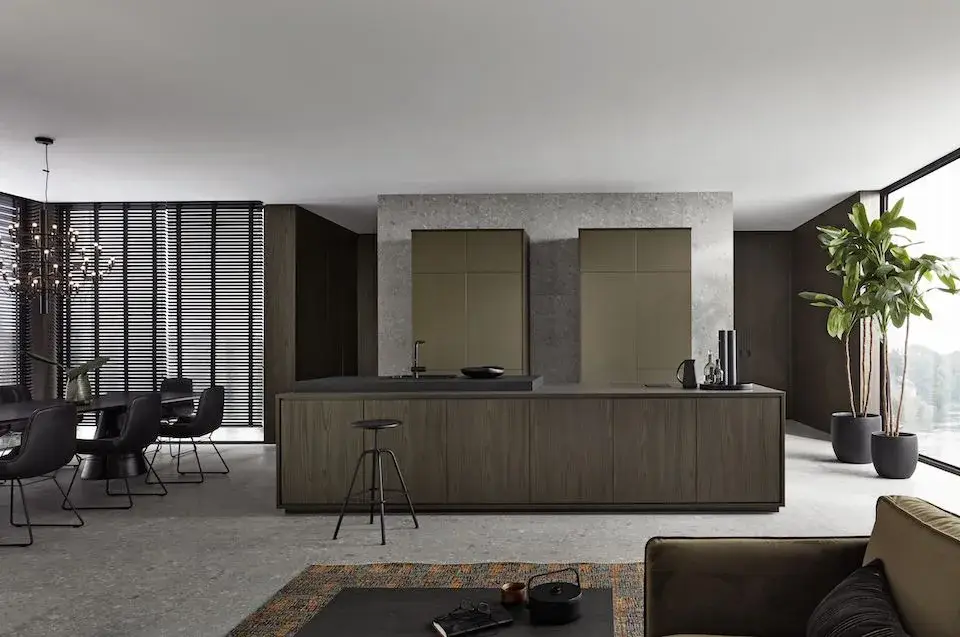 Nolte kitchen with a dark island and tall units in an open-plan space